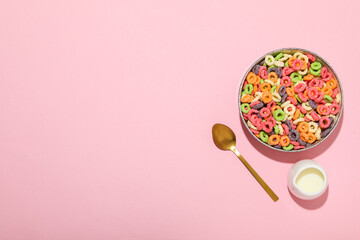 Colorful cornflakes, concept of tasty breakfast, morning food, space for text