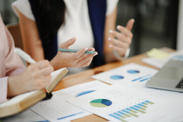 close up of business people working in office