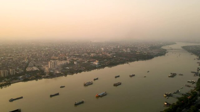 Vibrant aerial view of Kolkata’s Vidyasagar Bridge at sunset, where the city meets the glowing horizon.