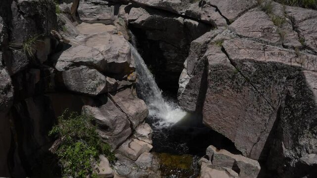 High-quality videos of mountainous landscapes with native vegetation, waterfalls, rivers, caves, and rock formations, showcasing central Argentina's natural beauty, perfect for large-format displays