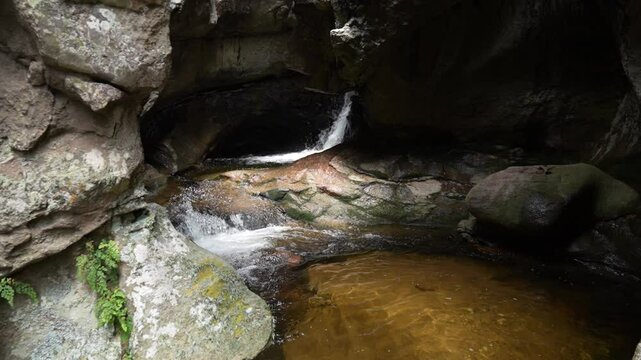 High-quality videos of mountainous landscapes with native vegetation, waterfalls, rivers, caves, and rock formations, showcasing central Argentina's natural beauty, perfect for large-format displays