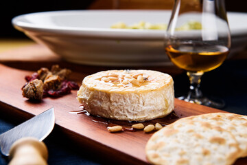 French Brie Cheese with Nuts and White Wine
