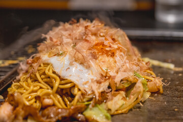 Okonomiyaki is one of Osaka’s famous foods.Teppanyaki is a Japanese cuisine that uses an iron griddle to cook food.