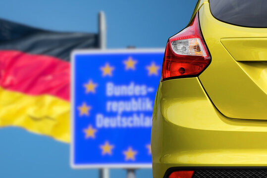 The flag of Germany and a modern car