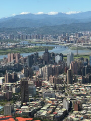 Obraz premium View of the Taipei horizon as seen during landing at the Songshan Airport -- the city's modern skyline
