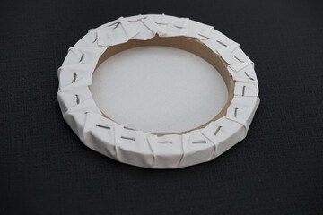round white canvas prepared for painting