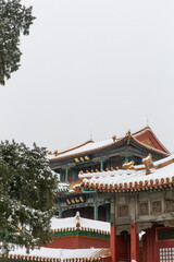 snow view of traditional Chinese opera stage of Forbidden City