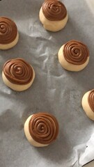 Soft coffee buns with a crispy coffee-flavored topping and a buttery filling. These aromatic treats offer a perfect blend of sweetness and coffee essence, ideal for pairing with your favorite brew.
