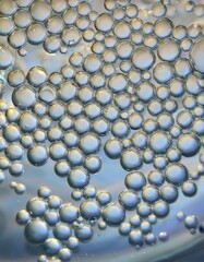 Close-up of iridescent bubbles in a liquid. Abstract texture.