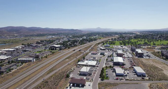 Daytime Traffic On Highways On Sunny Day In Elko, Nevada, USA. aerial shot