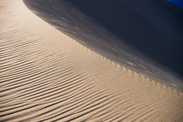Russia. Beautiful scenery of the northernmost desert in the world. View of the Kodar Ridge. Chara sands. The region of baikaL Kodar National natural park.