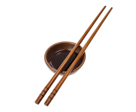 Traditional bamboo chopsticks and soy sauce bowl, isolated on transparent cutout background