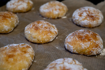 Culinary background.Ready-made homemade cookies on baking paper.