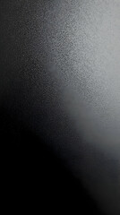 Abstract Black and White Textured Background Creates a Dramatic, Grungy Effect with Subtle Lighting