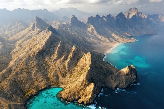 Aerial view Coastal mountain range, turquoise ocean, secluded beach, dramatic clouds, travel brochure