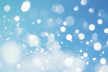 Obraz premium Abstract blue bokeh background with bright lights and sparkles.