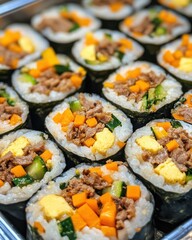 Delicious Kimbap: Close-up of Korean Seaweed Rice Rolls with Beef, Carrots, and Cucumbers