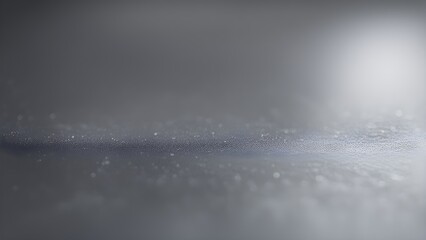 Abstract gray background with subtle texture and bokeh lights, ideal for product presentations or website banners.