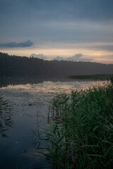 Sunset, twilight on a forest lake. Night landscape