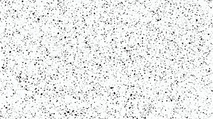 Naklejka premium Black and White Speckled Abstract Background Texture Creates a Visual Interest Uniformly.