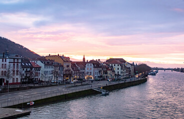 Obraz premium Traditional buildings and residences along the Neckar River in Heidelberg Germany. Photo taken during sunset