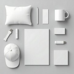White Minimalist Branding Mockup with Everyday Objects Including Baseball Cap, Coffee Mug, Pillow, Business Cards, Notebook, Pen, and Lanyard in Clean Aesthetic