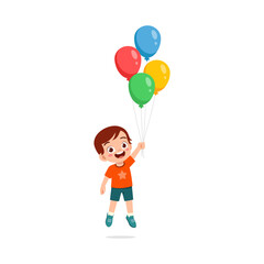 little kid holding balloon and feeling happy