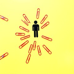 Fototapeta premium Stick Figure Silhouette with Radiating Red Lines on Yellow Background in Minimalist Warning Sign Aesthetic, Caution Symbol, and Abstract Representation with Bold Colors