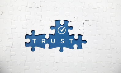 puzzle pieces with the word Trust