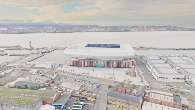 Aerial panning shot of Everton football club's new stadium at Bramley Moore pier, Liverpool
