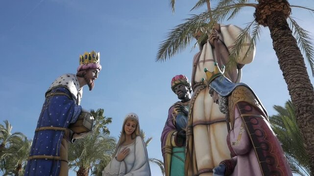 Giant Nativity figures in the city a sunny day in the town hall of Alicante, Spain.