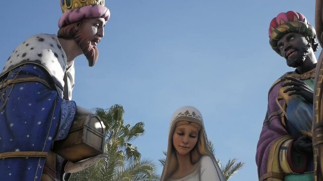 Giant Nativity figures in the city a sunny day in the town hall of Alicante, Spain.