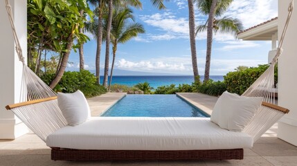Cozy Outdoor Seating Area with Pool and Ocean View Surrounded by Palm Trees for Relaxation and Wellness Retreat