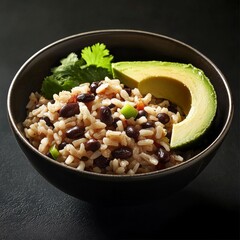 Close-up of a bowl of rice and beans with a side of avocado. Featuring a healthy and nutritious meal. Highlighting the texture and flavors of the rice and beans. Ideal for food and health themes.