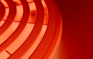 Part of round platform with concentric pattern illuminated with red light copy space stock image