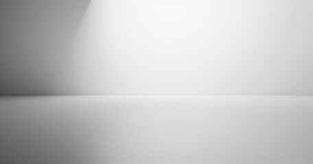 A minimalistic, well-lit empty space with a smooth surface and neutral colors.
