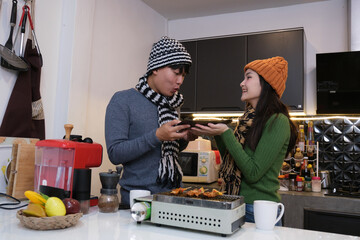 Young Asian couple living at home