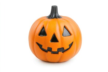 Fototapeta premium A pumpkin with a scary face is on a white background, with ample copy space for text.