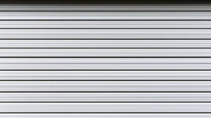 Obraz premium A close-up view of a white metal garage door with horizontal lines and smooth surface.