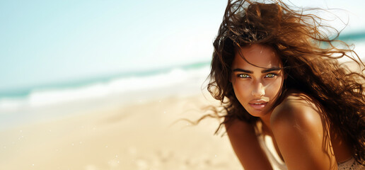 Naklejka premium Beautiful tanned woman enjoying the sun and waves on a serene beach at golden hour