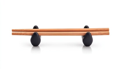 Elegant wooden chopsticks resting on a stylish black holder, set against a clean white background
