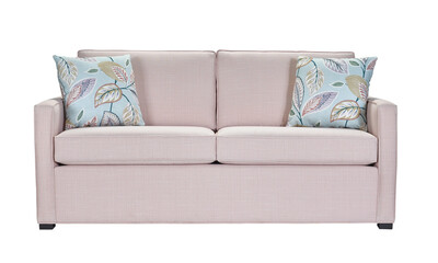 A sofa with pillows in a minimalist design with wooden legs + clipping path. The sofa is isolated on a White background.