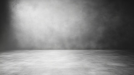a black and white photo of a room with a light coming in