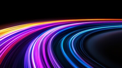 Colorful spiral with a black background. The colors are bright and vibrant, creating a sense of energy and excitement. The spiral seems to be moving, as if it's in motion or changing over time