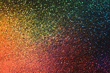 Glittery background in dark rainbow shades