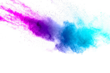 Pastel color dust particle splashing.Colorful powder explosion on white background.