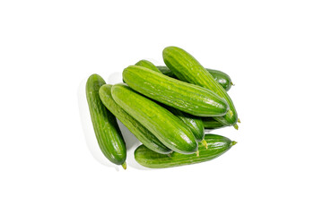 A bunch of cucumbers are piled on top of each other. They are green and have a bumpy texture Cucumbers on transparent background png format.