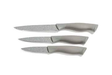 Obraz premium Three knives are shown on a white background. The knives are gray and have a pointed tip. The pens are gray, the knives are located next to each other. Kitchen knife on transparent background in PNG f