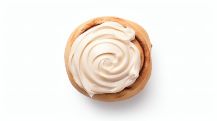 Freshly baked cinnamon roll topped with creamy frosting in a cozy kitchen setting