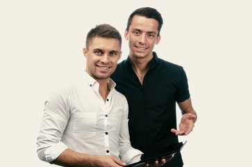 Young attractive gay couple planning for the future.